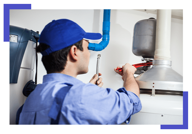 Plumber Repairing An Hot-Water Heater